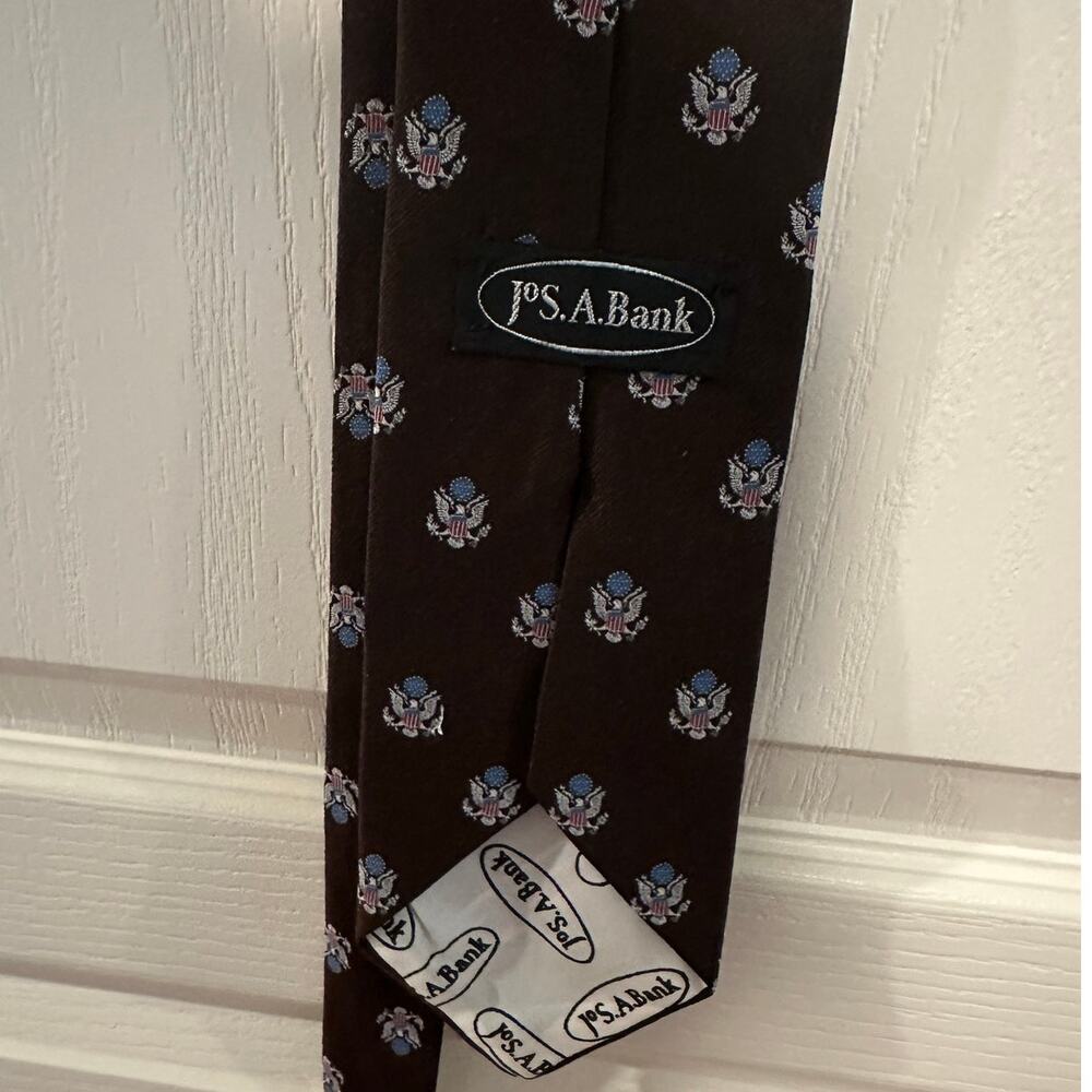 Jos A Bank American Eagle tie Brown background